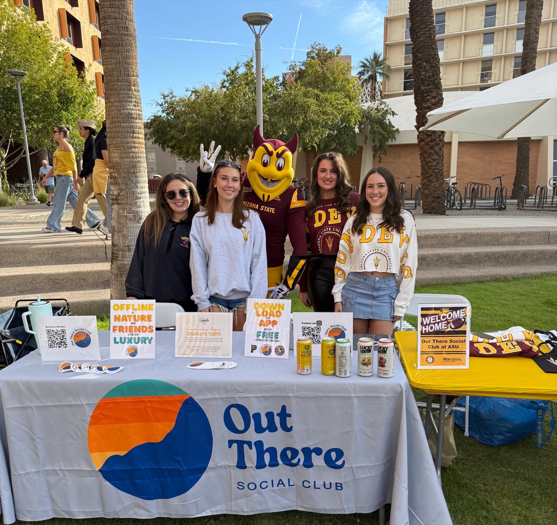 The Out There Social Club team tabling on ASU's campus with Sparky
